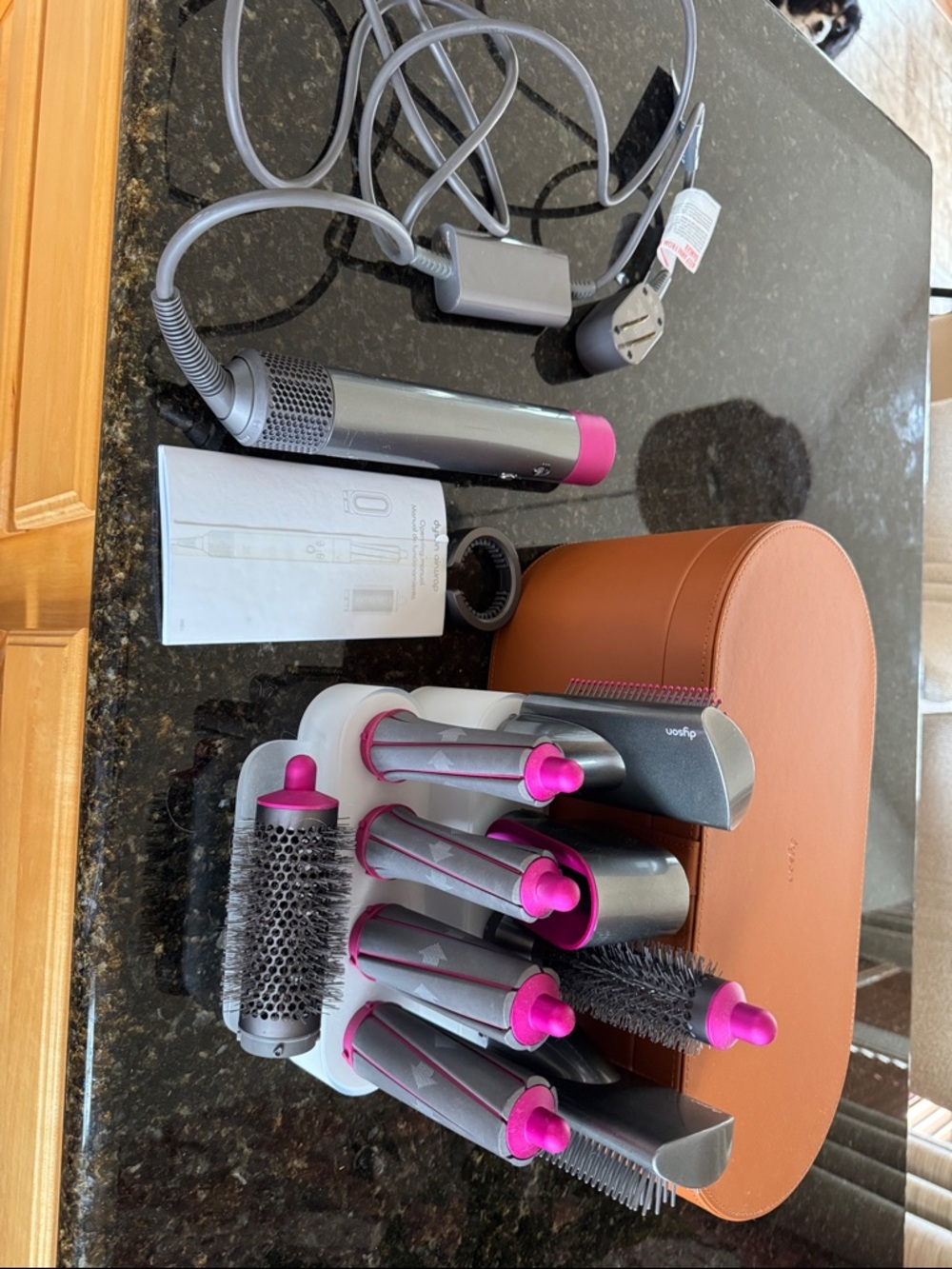Dyson styler set in Grey with Pink highlights